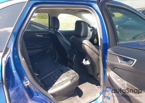 2021 Ford Edge Sel z USA, uszkodzony, nr VIN 2FMPK4J90MBA37496